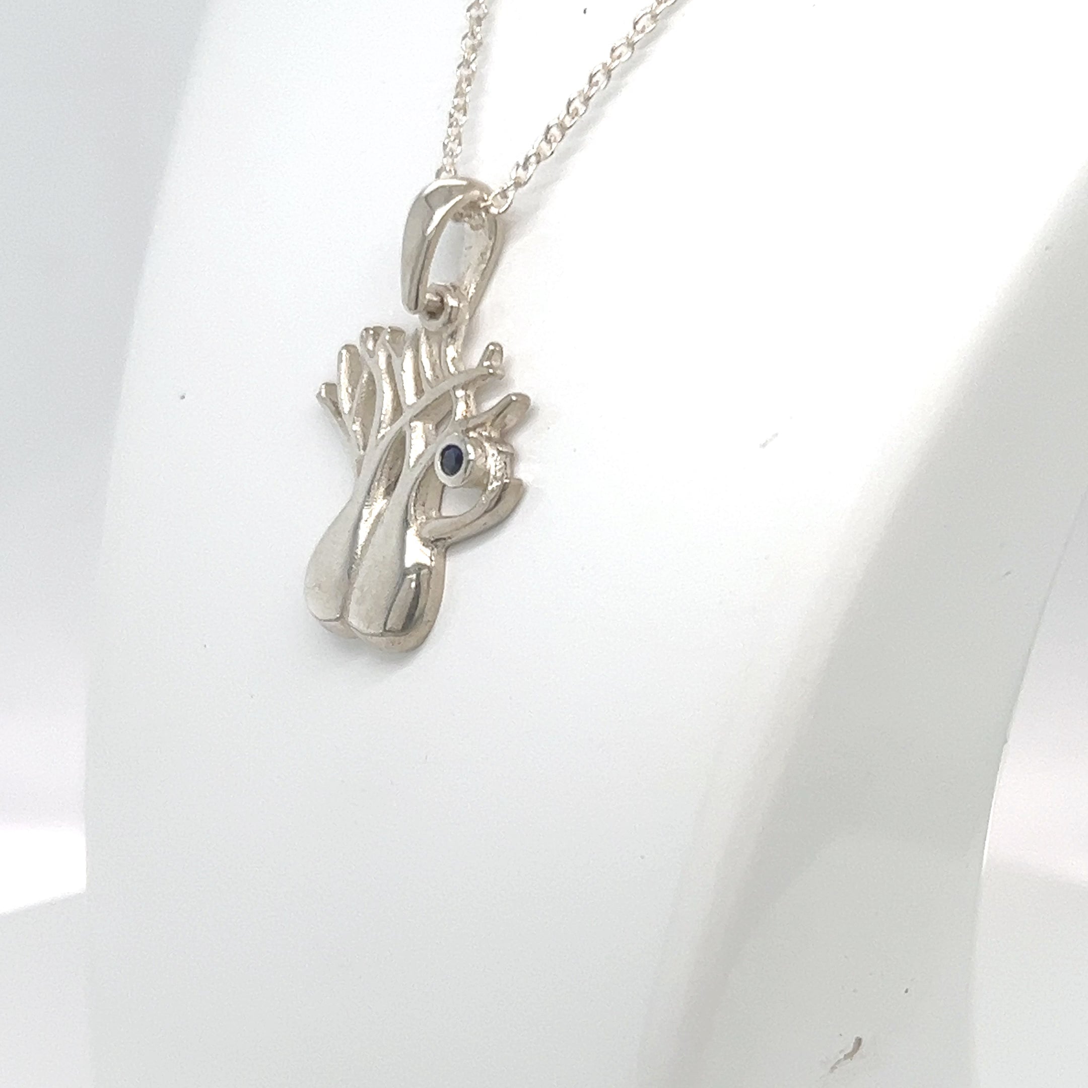 SILVER PLATINUM BOAB PENDANT WITH ROUND BLUE SAPPHIRE