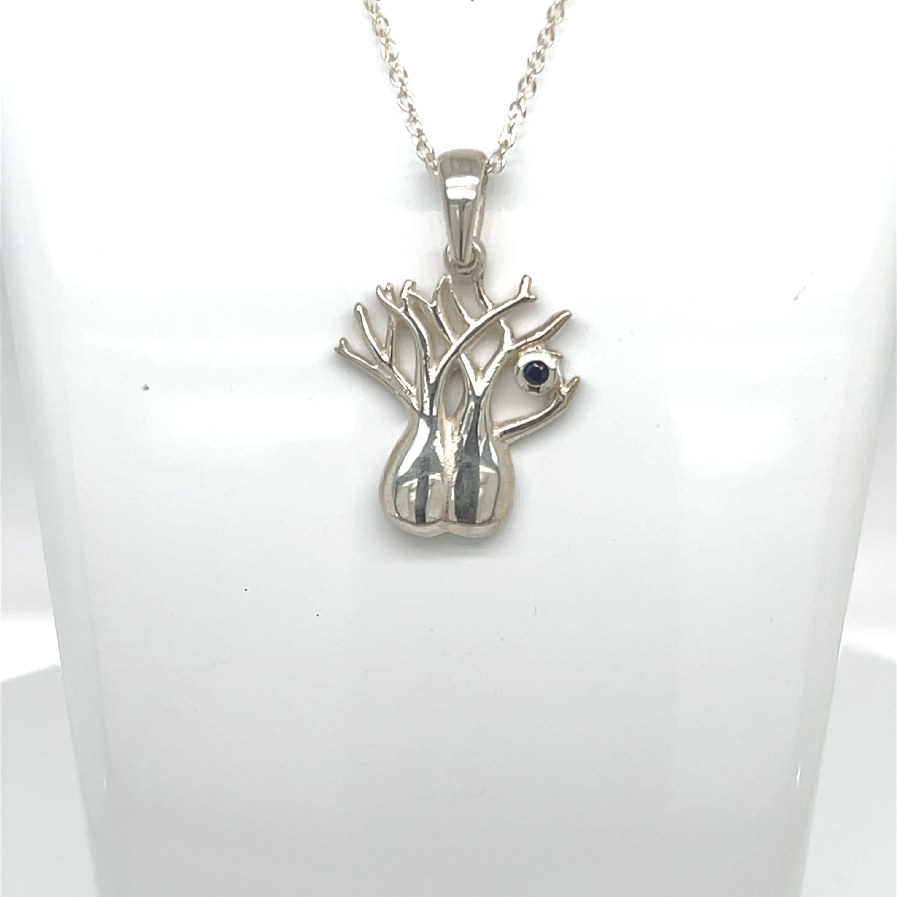 SILVER PLATINUM BOAB PENDANT WITH ROUND BLUE SAPPHIRE