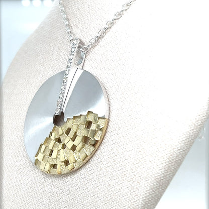 STERLING SILVER AND WHITE SAPPHIRE PENDANT