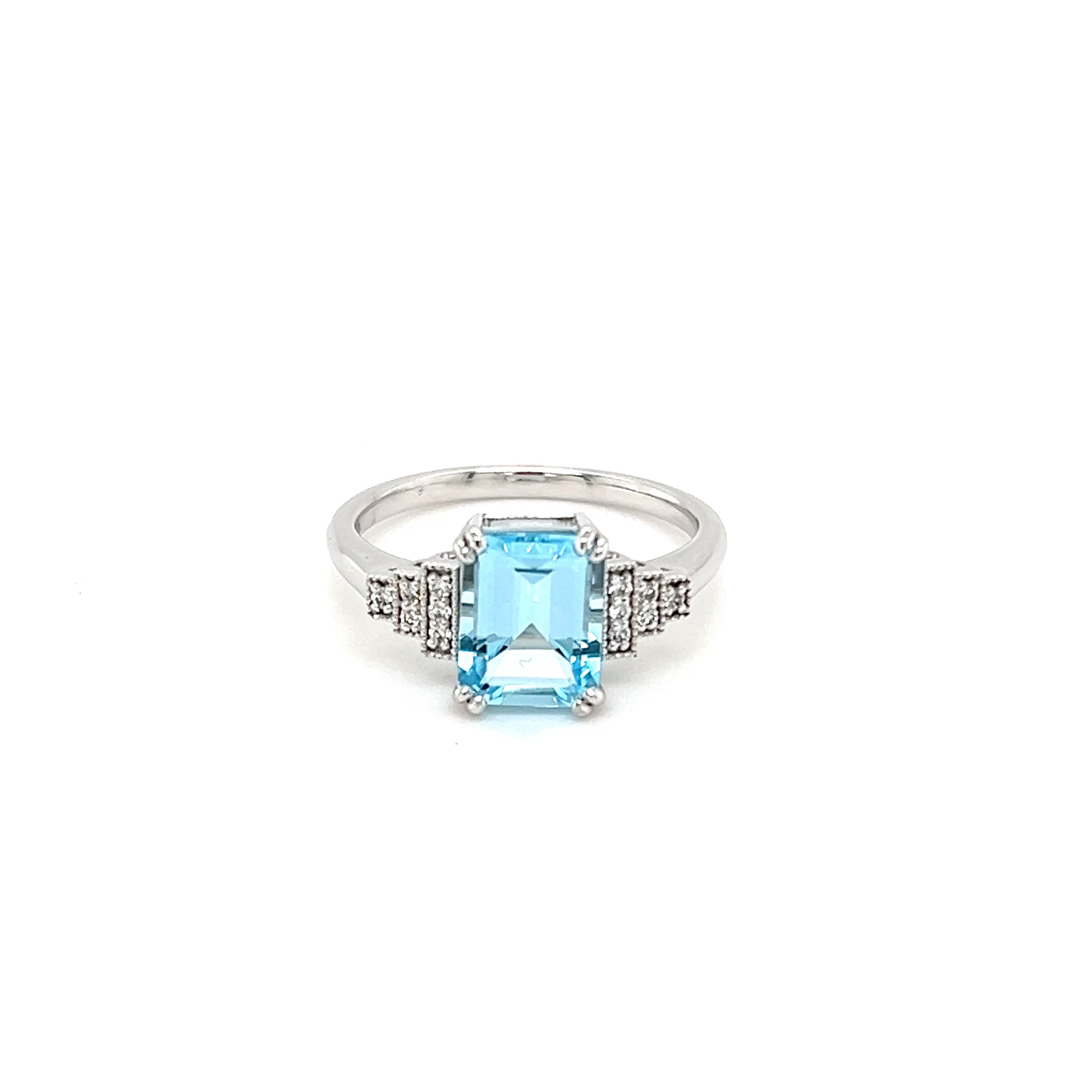 9ct White Gold Ring Featuring an Emerald Cut Blue Topaz