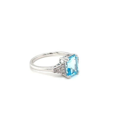 9ct White Gold Ring Featuring an Emerald Cut Blue Topaz