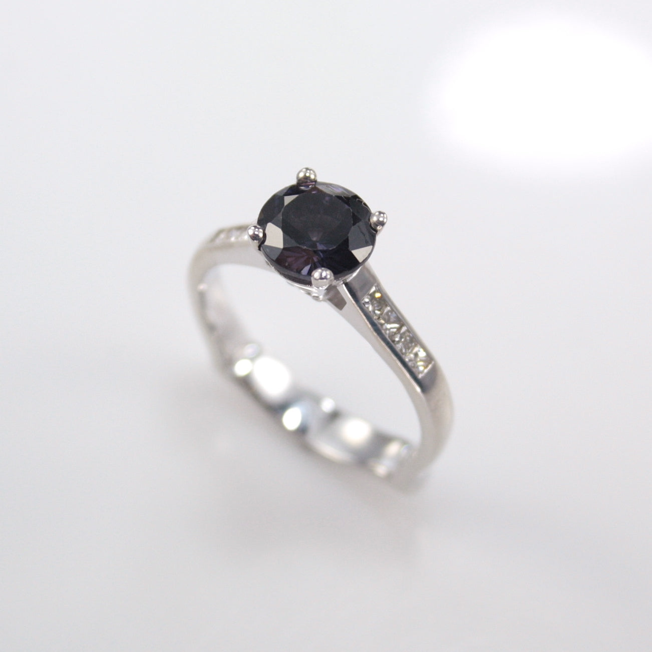PLATINUM BLUE SPINEL & DIAMOND RING