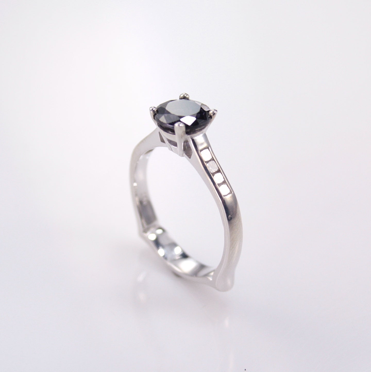 PLATINUM BLUE SPINEL & DIAMOND RING