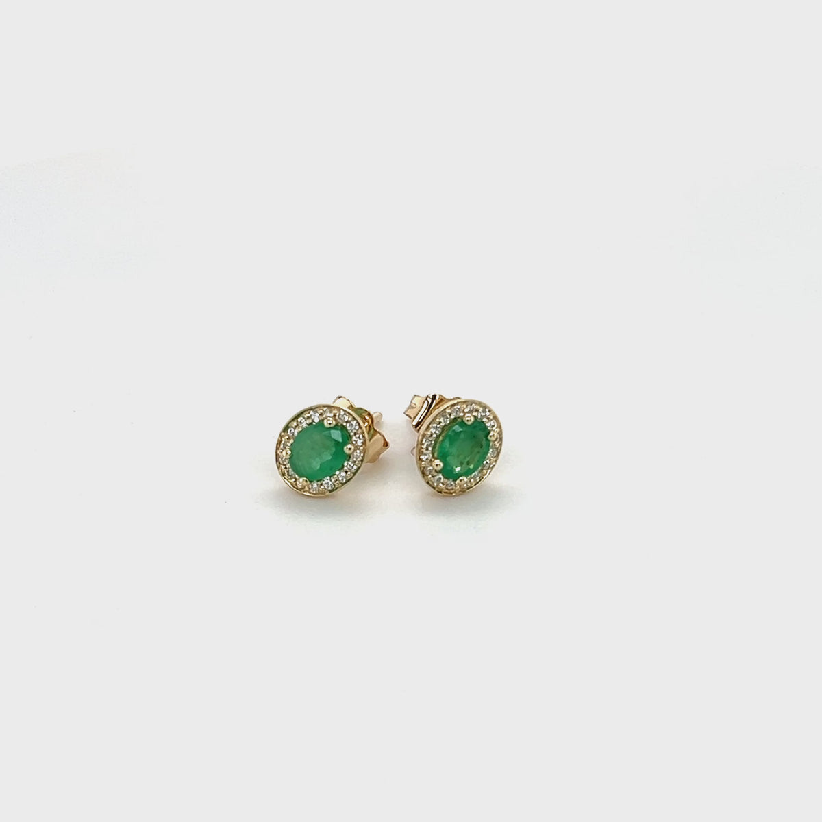 Load video: 9ct Yellow Gold Oval Emerald and Diamond Earrings