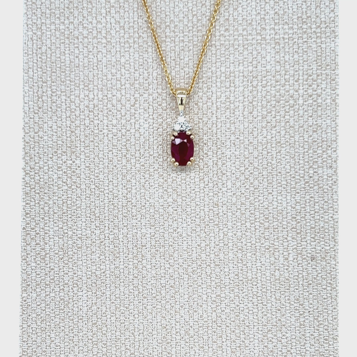Load video: 9ct Yellow Gold Oval Ruby &amp; Diamond Pendant