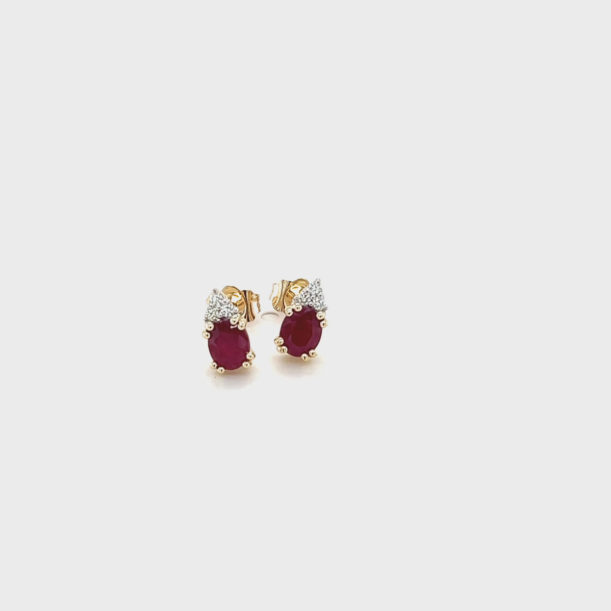 Load video: 9ct Yellow Gold Oval Ruby &amp; Diamond Earrings