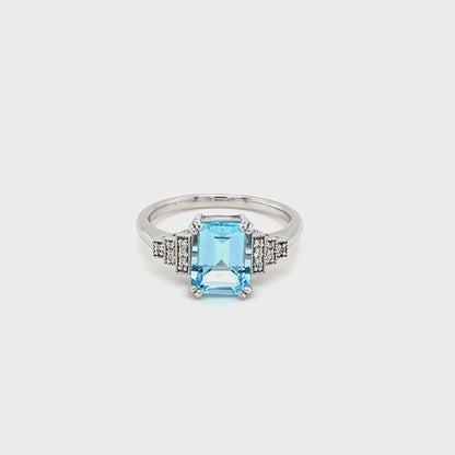 9ct White Gold Ring Featuring an Emerald Cut Blue Topaz