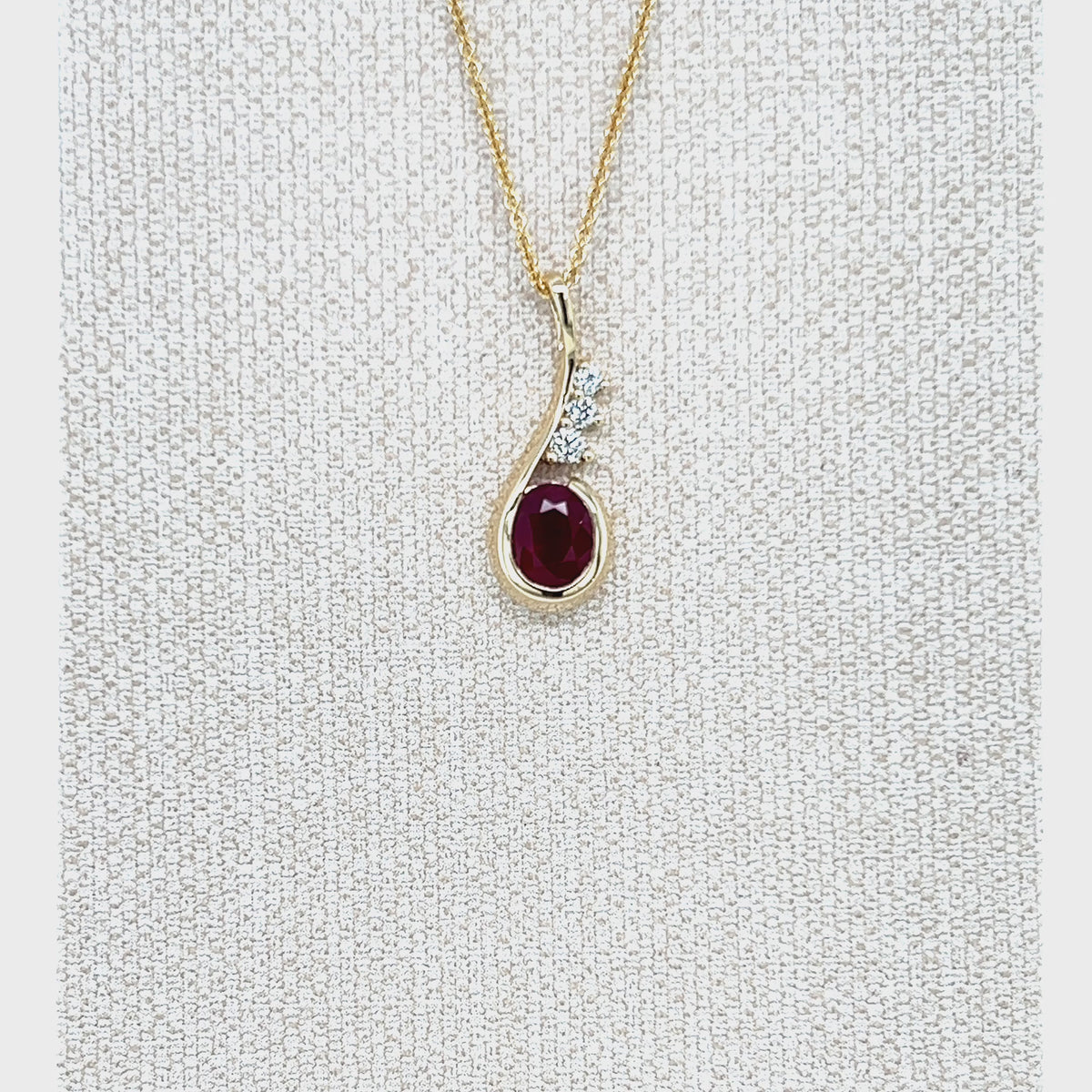 Load video: 9ct Yellow Gold Ruby and Lab-Grown Diamond Pendant