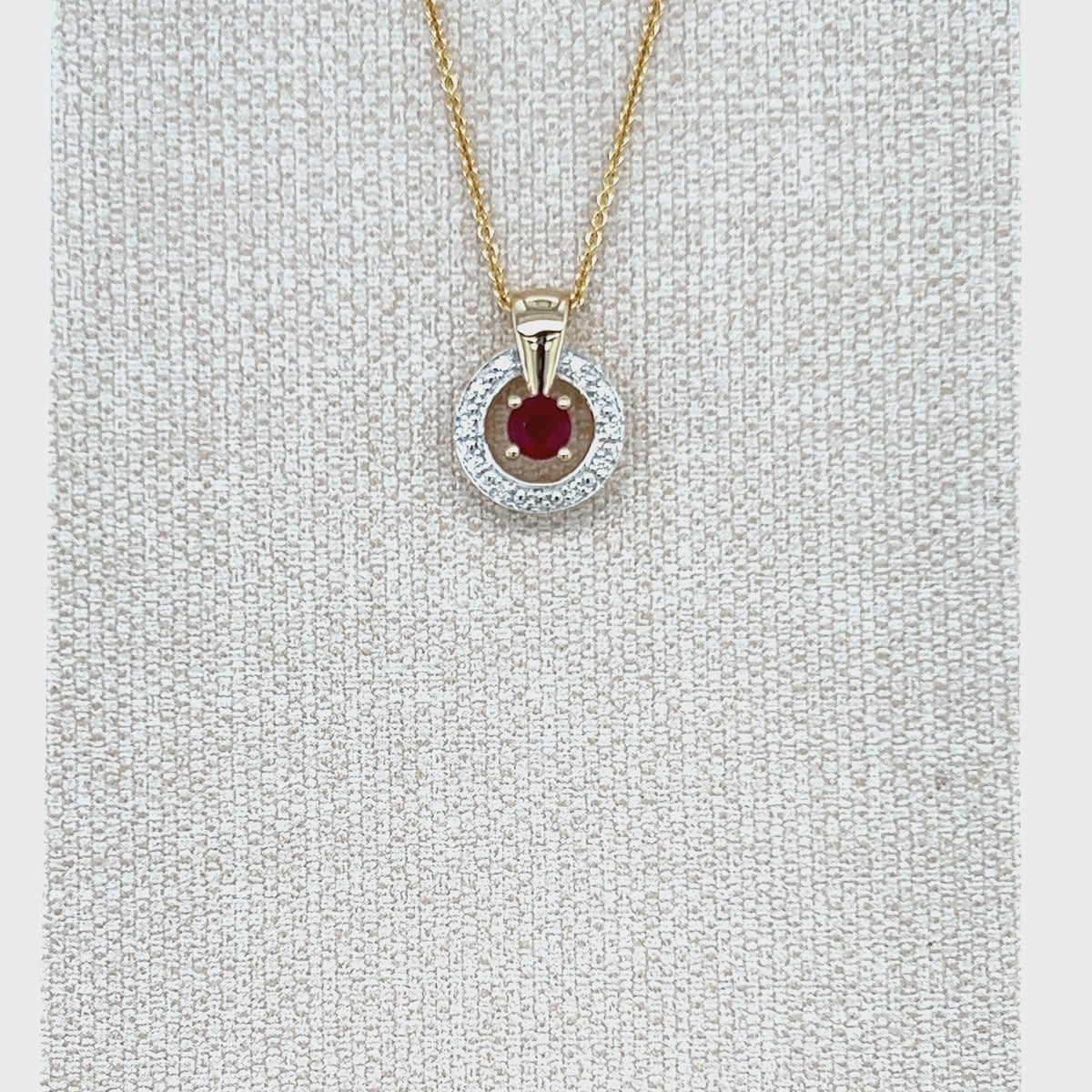 Load video: 9ct Yellow Gold Ruby and Diamond Pendant