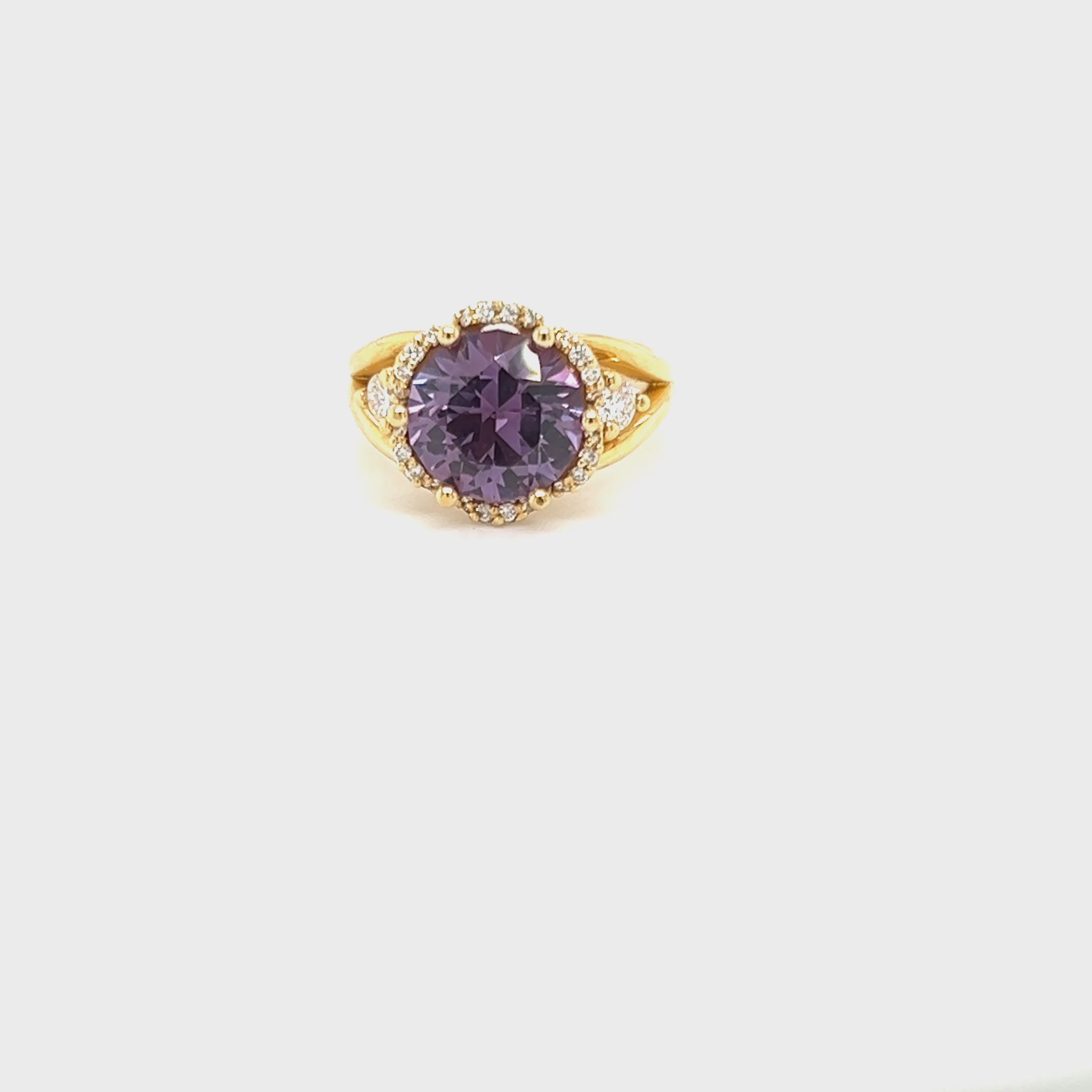 Load video: 18ct Yellow Gold Purple Sapphire and Diamond Ring
