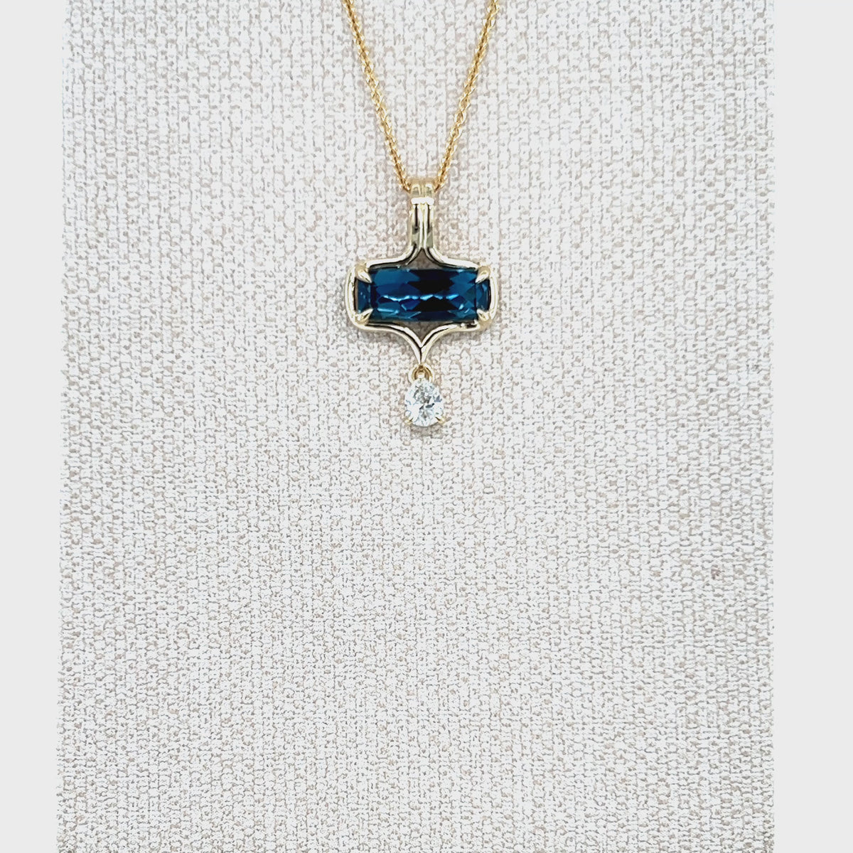Load video: 9ct Yellow Gold London Blue Topaz and Lab-Grown Diamond Pendant